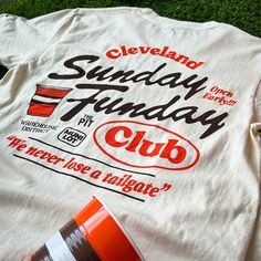 Every Sunday is a "Fun"day during Cleveland Football season! Whether your go-to tailgate spot is the Muni Lot, Warehouse District or The Pit, gear up for Game Day in this Unisex Crew T-shirt. Designed and printed right here in Cleveland on a super soft, relaxed fit, pre-shrunk, garment dyed and washed tee. 100% cotton. Note: This is a different fit from our normal tees. The tee runs shorter and has trendy boxy cut. Slight color variations may occur, given the pigment dyeing process. *This produc Fundraising Shirt Ideas Design, Cute Club Shirt Designs, Club Tshirt Designs Schools, Retro Shirt Design Graphic Tees, Restaurant Tee Shirt Design, Classic T Shirt Design, Field Day T Shirts, Brand Shirts Design, Dads Weekend Merch