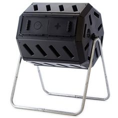 a large black speaker sitting on top of a metal stand