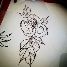 a drawing of a rose with leaves on it's side and another flower in the middle