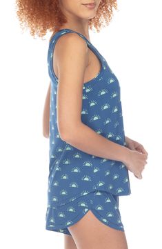 Streamline your evening routine with this soft jersey pajama set featuring a relaxed-fit tank and matching dolphin-hem shorts. 24" top length; 2" inseam; 30" leg opening; 12" front rise; 14 1/2" back rise (size Medium) Top has scoop neck; sleeveless 95% rayon, 5% spandex Machine wash, line dry Imported Comfortable Summer Activewear For Loungewear, Summer Sleeveless Sleepwear For Lounging, Comfortable Summer Tank Top For Lounging, Comfortable Sleeveless Sleep Tops, Sporty Pajama Shorts For Summer Relaxation, Casual Tank Top For Sleepovers, Sporty Stretch Summer Sleepwear, Racerback Tops For Loungewear, Athleisure Racerback Top For Loungewear