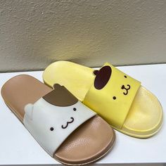 Brand New With Flaw Pompompurin Mismatched Sandals Size: 37 (Approximately Us Size 6) Featured Pompompurin And Custard **Please See Pictures For Flaw Details*** Yellow Sandal Has Discoloration On The Side And Toe Area. Also Has Line On The Sole. Brown Sandal Has Glue Residues On Sole And Little Discoloration On White Colored Area. Pompompurin Shoes, Pompompurin Pajamas, Pompompurin Pajama Set, Pompompurin Stuff, Pompompurin Merch, Yellow Sandals, Brown Sandals, Shoes Brand, Yellow And Brown