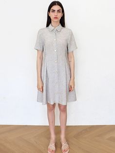 Editor's NotesThis shirt dress features tweed texture and A-line mini silhouette. Tucked front and button fastenings adds feminine touch. - Tweed dress- Mini length- Collar and buttoned front silhouette- Tucked front- A-line skirtMeasurements(in.)Size One Size(XS-M)- Bust: 23.23 in - Shoulder: 15.35 in - Waist: 16.14 in - Sleeve: 8.27 in - Length: 35.43 in * Model info: Height 5' 9Composition & Care- 60% Polyester, 40% Rayon - Dry Cleaning or Hand Wash Designer- by DAMAGE MNEMONIC Casual Tweed Dress With Short Sleeves, Short Sleeve Tweed Mini Dress For Work, Tweed Mini Dress With Short Sleeves For Work, Workwear A-line Linen Mini Dress, Casual Tweed Dress With Button Closure For Spring, Casual Tweed Dress With Button Closure For Work, Casual Spring Tweed Dress With Button Closure, Casual Mini Length Tweed Dress With Buttons, Summer A-line Tweed Dress For Work