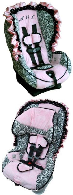 two baby car seats with pink and black designs on the front, one has an infant seat