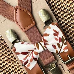 This floral terracotta bow tie & brown suspenders set is a great choice for the bowties for a terracotta wedding, fall wedding, groomsmen, ring bearer gift, bow ties for men, ring bearer outfit, any other special occasion. ❤X-Small: 6 months- 2 yearsSmall: 3 years- 5 yearsMedium: 6 years- 10 yearsLarge: 10 years- Up To 6ft tallAdult: Adults Over 6ft Tall**Please order a swatch to make sure the color is perfect before ordering a large order. We cannot accept returns for colors not matching since Adjustable Brown Belts And Suspenders With Bow, Terracotta Bow Tie, Groomsmen Ring, Fall Wedding Groomsmen, Wedding Ring Bearer Outfit, Light Terracotta, Ring Bearer Gift, Brown Suspenders, Bow Ties For Men