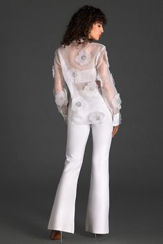 Step into a world of style with our organza embroider floral shirt. This shirt boasts intricate floral embroidery on delicate organza fabric, exuding modern elegance and charm. The addition of transparent elements adds a subtle allure, ensuring you radiate charm and confidence at every event. Handmade customization Fabric composition: 90% polyester fiber, 10% spandex Washing method: hand wash or dry clean Popular elements: organza Sheer Shirts, Simple Tank Tops, Sheer Shirt, Organza Fabric, Swimwear Sale, High End Fashion, Modern Elegance, Floral Shirt, Evening Wear