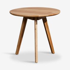 a round wooden table with three legs