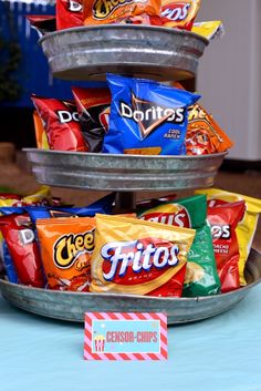 a metal tray filled with chips on top of a table