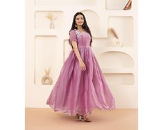 Pink Anarkali Gown Partywear Long Gown Floral Design Gown Indian Wedding Dress Festival outfit Midi Dress Flared Readymade Anarkali Dress  You gonna love elegance with Modern touch ,Here we Presenting Exclusive Anarkali shoot Design  Gown (Stitched) Gown Fabric : jimee chuu With Sequins Embroidery Work Size:-  S(36), M(38), L(40), XL(42), XXL(44) Lining/Inner : Micro cotton Flare :  3.5 Mtr Length : 54" 🌸 Welcome to ViaaCollectionUK! 🌸 Browse our exquisite collection of Indian ethnic wear and Navratri Celebration Maxi Length Dress, Navratri Celebration Maxi Dress, Maxi Length Self Design Anarkali Set For Reception, Maxi Length Anarkali Set For Reception, Chanderi Maxi Dress For Navratri, Navratri Chanderi Maxi Dress, Chanderi Gown For Reception, Designer Anarkali Maxi Dress With Cutdana, Chanderi Cutdana Embellished Maxi Dress