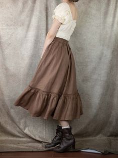 Our new linen skirts are the perfect garment for renaissance faire costumes and cottagecore wardrobes alike! We wanted to create a piece that was as multi-functional and versatile as it was well made and timeless. Our linen skirts are the perfect wardrobe staple, perfect for pairing with our corsets and chemises for the renaissance festival, or wearing with a blouse for a casual look. This oh-so-soft linen will have you twirling back to ye olde times. This cocoa brown skirt is made from a 100% l Medevil Aesthetic Outfits, Historical Skirt, Archaeology Outfit, Medieval Skirt, Casual Medieval Outfits, Ren Fair Short Skirt, Brown Cotton Flowy Skirt, Ren Fair Layered Skirt, Brown Flowy Cotton Skirt