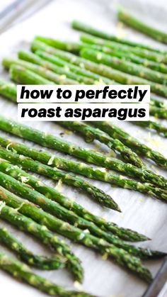 asparagus spears on a baking sheet ready to be cooked in the oven for dinner