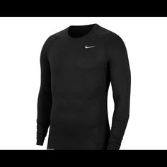 Rock Outstanding Athletic Style In Nike’s Long Sleeve Fitted Top With Fleece Inside .You Will Definitely A Piece Like This In Your Little Ones Closet Snug Fit Black Cotton Tops, Black Snug Fit Cotton Tops, Nike Crew Neck Fitted Top, Nike Fitted Crew Neck Top, Nike Basic Long Sleeve Tops, Basic Long Sleeve Nike Tops, Black Cotton Snug Fit Tops, Basic Black Nike Top, Nike Fitted Long Sleeve Tops