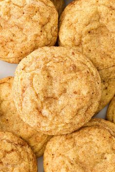 a pile of cookies sitting on top of a white plate