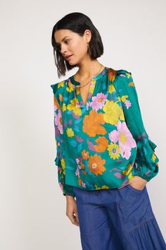 This floral-print blouse offers a welcome punch of color and pattern to the season's ensembles. Detailed with a clean placket and ruffle trim at the shoulders and sleeves, the V-neck top will become an instant favorite. •Split neckline with placket •Long sleeves •Elasticized cuffs •Ruffle trim •Relaxed fit •Relaxed Fit DIMENSIONS •Standard: 24.75" Length Item number 2230399-1100% Polyester Botanical Floral Prints, Floral Tattoo Sleeve, Floral Sleeve, Floral Print Blouses, Woven Top, Floral Ruffle, Green Blouse, Print Blouse, V Neck Tops