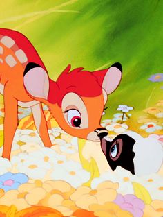 the fawn and her lamb are sharing a kiss in this scene from disney's animated