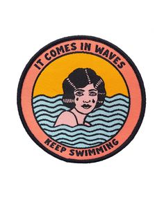 a patch that says it comes in waves keep swimming