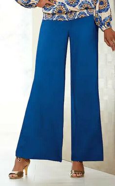 Non-stretch Blue Pants, Elegant Blue Bottoms For Summer, Blue Stretch Pants, Blue Stretch Pants Solid Color, Elegant Blue Summer Bottoms, Blue Party Pants With Pockets, Blue Solid Wide Leg Pants For Spring, Blue Solid Color Wide-leg Pants, Casual Blue Stretch Dress Pants