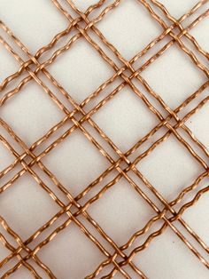 a close up view of some metal mesh