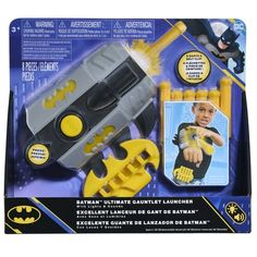 Imagine battling villains just like the Caped Crusader with the Batman Ultimate Gauntlet Launcher role-play toy. Kids will feel ready for action when they secure this dart launcher to their forearm and clip the dart holster, complete with 6 foam darts, onto their belt or waistband. Ready, aim, launch! With a swift pull of the lever and a press of the button, they can launch darts into the air. Press the yellow button for awesome sound effects and a glowing Batman logo. This wearable dart launcher, complete with lights and sounds, is ideal for active, imaginative superhero adventures, perfect for kids ages 3 years and up. 3 x AAA batteries required (included). BATMAN and all related characters and elements  &  DC Comics and Warner Bros. Entertainment Inc. WB SHIELD:  &  WBEI. (s24) Color: M Batman Toys, Caped Crusader, Batman Kids, Batman Logo, Action Figure Accessories, The Batman, Aaa Batteries, Play Toys, Baby And Toddler