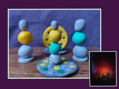 a group of toys sitting on top of a wooden table next to a fire place