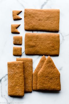 some cookies are cut up and placed on a table