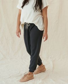 This worn in sweatpant is the perfected version of a vintage gym pant. Its drawstring waistband and ribbed cuffs make for a relaxed look. 100% Cotton Machine Wash Cold Tumble Dry Low Made in the U.S.A. Relaxed Fit Sweatpants With Elastic Waistband And Cuffed Ankles, Relaxed Fit Sweatpants With Elastic Cuffs, Comfy Relaxed Fit Joggers With Elastic Cuffs, Relaxed Bottoms With Elastic Cuffs, Comfortable Joggers With Elastic Cuffs And Relaxed Fit, Relaxed Sweatpants With Tapered Leg, Relaxed Fit Loungewear Bottoms With Cuffed Ankles, Relaxed Leisure Pants With Elastic Cuffs, Comfy Relaxed Fit Joggers With Ribbed Cuffs