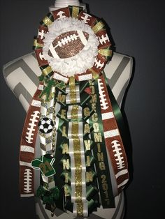 a football themed decoration on top of a mannequin