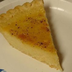 a piece of pie sitting on top of a white plate