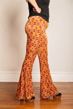 *These pants are Ready to Ship* Click to view Size Chart Inspired by Art Deco, we designed this print in collaboration with Flare Street. These velvet flares are super versatile and the perfect statement pants all year round. The lustrous Gold print can be dressed up or worn casually. SIZE CHART:Model is a 31" wearing a size LargeBe sure to check the size chart before ordering, these have a lot of stretch but do run a bit small. Say Hello To Flare Street! Let's spread the Flare-Love! Our flares Statement Pants, Velvet Flares, Gold Velvet, Gold Print, Melbourne Australia, Fabric Store, Two Piece Pant Set, Quality Fabric, Melbourne