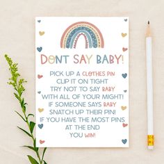 a card with the words don't say baby on it next to a pencil