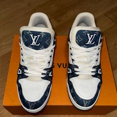 For The First Time, The Cult Lv Trainer Sneaker, A Staple Of The Men's Collection, Is Revisited For Women In Calf Leather And Monogram Denim. This Classic Design, Created By Virgil Abloh, References Vintage Basketball Sneakers. It Features Numerous Signature Details, Including The Lv Initials On The Tongue And Side, And Monogram Flowers On The Outsole. - Blue - Calf Leather And Monogram Denim - Rubber Outsole - Lv Initials On The Tongue, Side And Back - Vuitton Signature On The Side - Monogram Flowers On The Outsole - Made In Italy Luxury Low-top Custom Sneakers With Cushioned Footbed, Luxury Custom Low-top Sneakers With Cushioned Footbed, Lv Trainer Sneaker, Vintage Basketball, The Cult, Basketball Sneakers, Trainer Sneakers, Louis Vuitton Shoes, Virgil Abloh