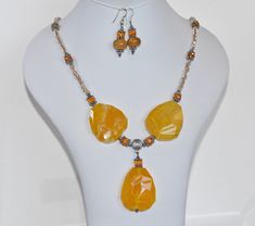 "Stunning reversible necklace featuring a centrepiece of 3 large facet cut honey agate gemstones.  Lovely rich golden shade beautifully matched.    The upper part of the necklace is made up of gold inlaid glass cube beads and honey coloured heishi beads with silver spacers and 925 lobster catch.    Necklace is hand made, one only piece 22\" long not counting the drop which hangs a further 2\".  The large agate gemstones are 40mm long and 33mm wide x 8mm thick in centre (tapered on outside) Weigh Tube Necklace, Evening Jewelry, Glass Cube, Cube Beads, Silver Necklace Statement, Gold Statement Necklace, Art Deco Necklace, Honey Colour, Geometric Necklace