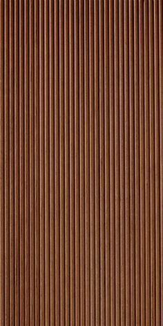 a close up view of a wooden surface with vertical lines on the top and bottom