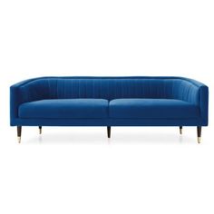 a blue velvet couch with gold legs and an angled backrest, viewed from the front