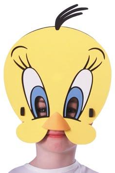 a person wearing a yellow duck mask with blue eyes