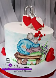 a cake decorated with an image of two people hugging each other on top of it