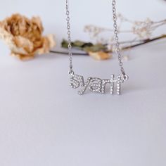 This necklace is handmade according to your name and font,18 K gold plated, full drilled with white l rhinestones, it is very unique and shining to be a birthday gift or daily wear. Material： Stainless steel,White zircon, high-quality 18 K gold Plated(High quality Color retention) Size: Pendant size: about 25 mm*8 mm, mainly depends on your name length and font. Chain thickness: 1.5 mm Custom: 1, Select the color and chain length you need. 2, Input the letters you need in the 'Personalization' p Initial Letter Necklace, Custom Rhinestone, Writing Gifts, Pendant For Women, Necklace Diy, Christmas Gifts For Friends, Birthday Gift For Her, Initial Letter, Chain Jewelry