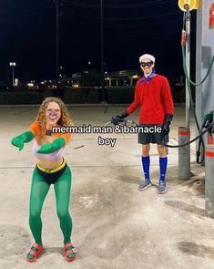 a man and woman in costume standing next to each other near a gas pump with the caption mermaid man & barnacle