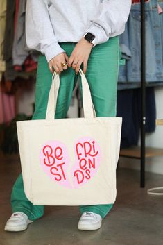 A set of tote bags for you and your bestie! Includes TWO tote bags 100% cotton canvas/ pink and red design Screen printed with love by JZD in Brownsville, TX Pocket inside Measurements Tote bag: 14" x 14"  Depth: 5.5" Handles: 11" Pink Letter Print Bag For Shopping, Pink Shopping Bag With Letter Print, Pink Letter Print Shopping Bag, Casual Shopping Bag For Valentine's Day, Casual Pink Bag For Valentine's Day, Valentine's Day Pink Tote Shoulder Bag, Weekend Cotton Bag With Double Handles, Casual Pink Shoulder Bag For Valentine's Day, Red Letter Print Bags For Shopping