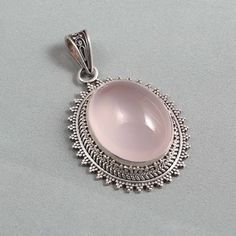 This Beautiful Rose Quartz stone Pendant Antique Look is 100% Handmade In Nepal. Stone is real and one of the finest stone. This stone is base on 925 silver pendant. Metal:- 925 Sterling silver Stone:-  Rose Quartz Stone Size:- 50x28 mm Hand Crafted by Local Silversmith in Patan, Kathmandu, Nepal. Antique Look. Your Feedback is very Important for us.  If you have any problem regarding packaging or product, kindly contact us to resolve the issue before leaving Negative Feedback... We Try to Give Our Customer The Best Quality. Rose Quartz Gemstone Pendant Jewelry, Silver Jewelry With Natural Stones In Rose Quartz, Silver Rose Quartz Pendant Jewelry, Silver Rose Quartz Jewelry With Natural Stones, Silver Rose Quartz Gemstone Jewelry, Pink Natural Stones Gemstones In Sterling Silver, Handmade Oval Rose Quartz Jewelry, Silver Oval Rose Quartz Jewelry, Oval Rose Quartz Silver Jewelry