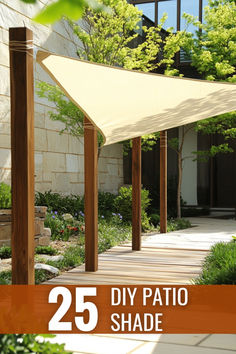 the 25 diy patio shade is made from wood and has white fabric on it