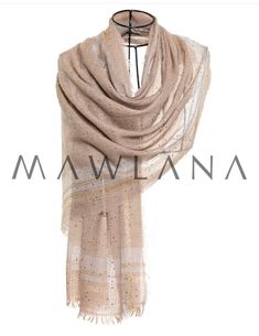 Queen bee beige pashmina  Silver and gold  Luxurious 100% Modal Shawl with Swarovski beads . *Material : 100% pure modal + Swarovski beads  *Feel : Very Soft lightweight delicate *Care : Dry Clean *Dimensions: *Length 78.7 In. | 200.Cm. *Width 27.5 In. | 70 Cm. Mawlana collaboration Dry clean only Luxury Gold Shawl For Ceremonial Occasions, Elegant Cream Shawl Dupatta, Elegant Brown Shawl Dupatta, Elegant Brown Pashmina Scarves, Elegant Brown Pashmina Scarf, Beige Dupatta Scarf Shawl, Elegant Gold Shawl-style Dupatta, Elegant Gold Shawl-shape Dupatta, Elegant Gold Shawl Dupatta