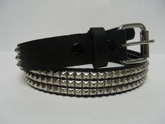 3 row studded belt, 1 and 1/4" wide.THIS IS A GREAT BELT. Made in The U.S.A. BUILT TO LAST GENUINE LEATHER. Leather color/finish : ( please select at check out )BlackRedWhiteBrownPinkbelt has snaps making the buckle interchangeable with your own buckle. 3 rows Black Large 1/4" ( 7 mm ) Py-77 Pyramid Square Studs ( Chrome/Silver Finish )The buckle is also in the same Finish1-1/4" ( 30 mm ) Wide Genuine Leather Belt. sizing is to the center hole. There is 7 holes for adjustments.for a good fit you Studded Belts, Spikey Belt, Stud Belt, Spiky Belt, Emo Belts, Spiked Belt, Black Studded Belt, Scene Jewelry, Pink Belt