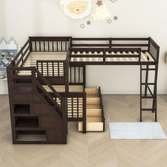 there is a bunk bed with stairs next to it and a rug on the floor