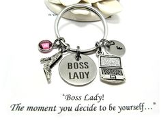 a keychain that says boss lady, the moment you decide to be yourself