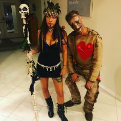 two people dressed up as zombies and skeletons