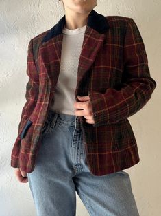 - Vintage Jones New York plaid blazer jacket - 100% wool shell - Padded shoulders - Made in Canada - Tagged 10 Chest: 19" Length: 23.5" Sleeve: 22.5" We are not responsible for lost, stolen, or damaged packages once they have been shipped. Any additional customs duties or taxes incurred on international orders are the responsibility of the buyer. Please note that our items are vintage and may have minor flaws or imperfections due to their age, which adds to their unique character. Plaid Wool Sport Coat For Work, Winter Plaid Wool Tweed Jacket, Tailored Plaid Wool Outerwear, Plaid Wool Tweed Jacket With Notch Lapel, Fitted Plaid Tweed Wool Jacket, Winter Plaid Single Breasted Sport Coat, Classic Plaid Blazer For Winter, Plaid Lapel Collar Sport Coat For Winter, Plaid Wool Tweed Jacket For Office