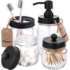 mason jars with toothbrushes, soap dispenser and lid are shown