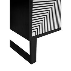 a black and white cabinet with stripes on it