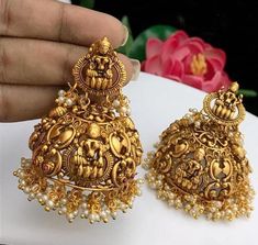 These Jhumka Earrings set have an excellent finish and gives out an exquisite sense of style. Materials: GOLD PLATEDClosure: Push backStyle: Boho & hippiePlease contact us for Bulk Orders.Occasions: Wedding Wear, Party Wear, Festive Wear, Durga Puja, Indian Wear, Sangeet Wear, Bridal Wear, Chrismas Day, Mothers Day, Haldi Wear.NOTE*Actual color may vary slightly from your monitor.*We dispatch the product within 5 days after Confirmation of Payment Received.*Payment accept through PayPal only