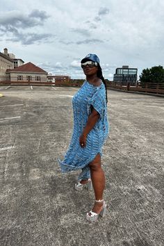 Denim will ALWAYS be a vibe and this light weight denim maxi dress does not disappoint! Cut slits throughout this flowy statement piece that has multiple styling options to give you an edge! Leg split allows comfort and versatility to be worn on either side. In One Size fits up to 3X Styling tip: Can be worn over jeans, dresses, on it's own. Dress is not see through. Styling options are endless! Available in Medium Blue , Dark Denim and Black Denim Size US Size One Size Blue Oversized Maxi Dress With Short Sleeves, Oversized Blue Maxi Dress With Short Sleeves, Oversized Blue Midi Dress, Casual Midi Dress With Side Slits For Beach, Oversized Blue Midi Dress For Spring, Casual Light Blue Maxi Dress For Day Out, Casual Midi Dress With Side Slits For Vacation, Casual Long Maxi Dress, Spring Oversized Maxi Dress For Day Out